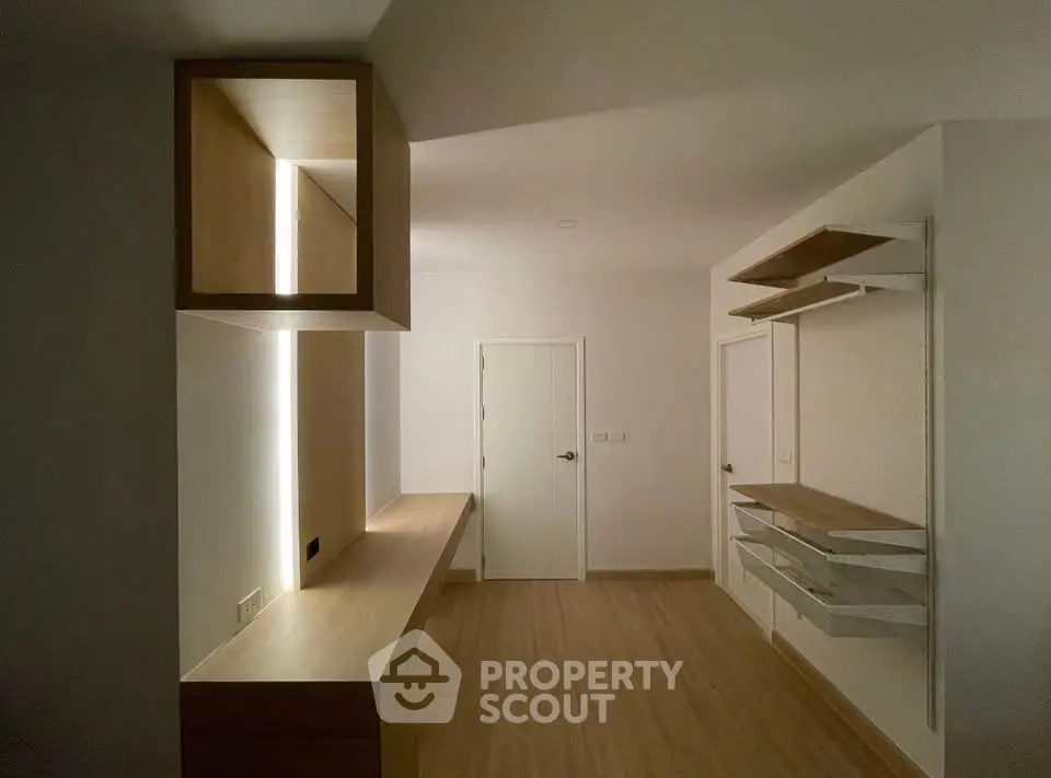 Modern minimalist interior with sleek wooden finishes and ambient lighting