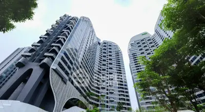 Stunning modern high-rise buildings with unique architectural design and lush greenery.
