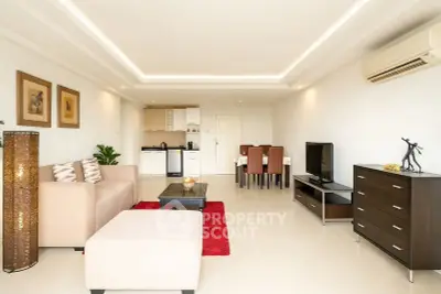Spacious modern living room with elegant decor and open layout, perfect for entertaining.