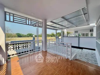 Spacious modern balcony with scenic view and sleek design