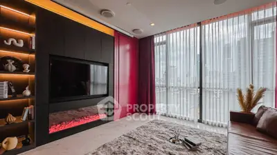 Luxurious living room with modern fireplace and floor-to-ceiling windows offering stunning city views.