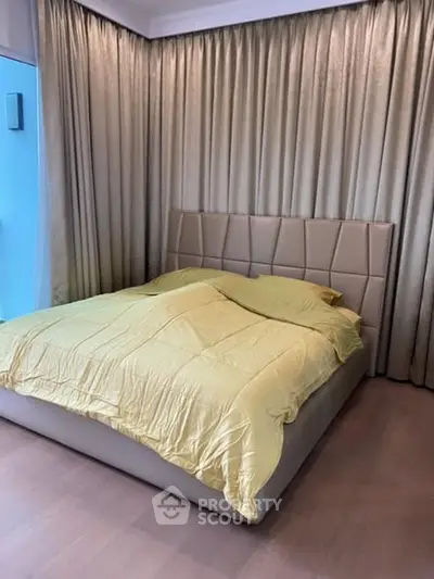 Luxurious bedroom with elegant curtains and modern bed design