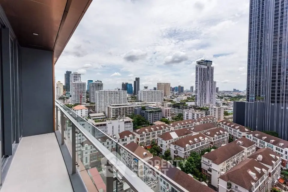 Stunning cityscape view from a modern high-rise balcony, showcasing urban living at its finest.