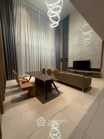 Luxurious modern living room with high ceilings and elegant lighting