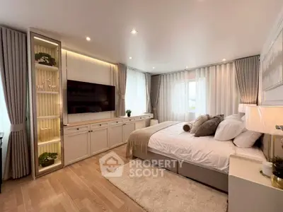 Luxurious bedroom with elegant decor and natural light