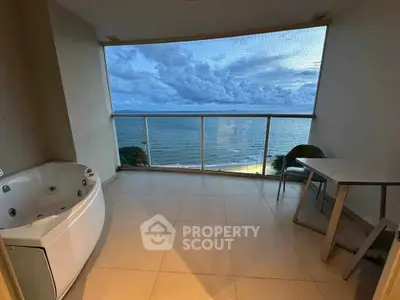 Luxurious balcony with jacuzzi offering stunning ocean views