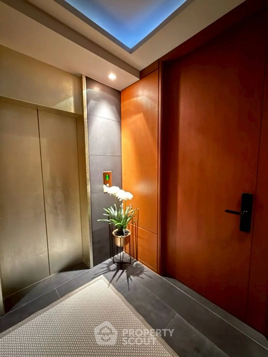 Luxurious elevator lobby with elegant lighting and modern design