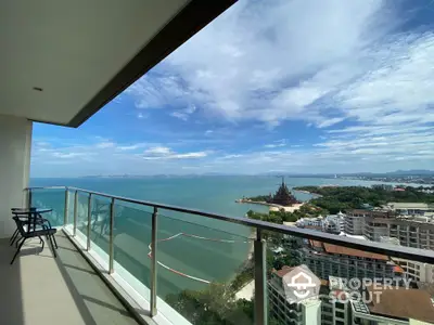 Stunning high-rise balcony with panoramic ocean view and cityscape