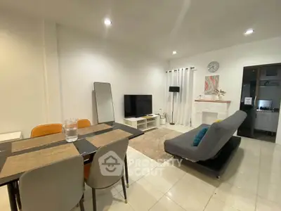 Modern living room with sleek furniture and cozy ambiance