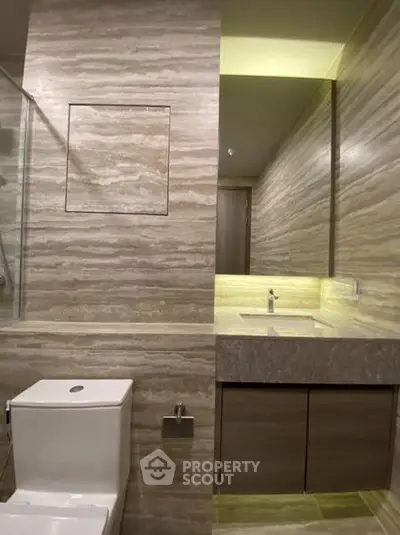 Luxurious modern bathroom with elegant marble finishes and sleek fixtures