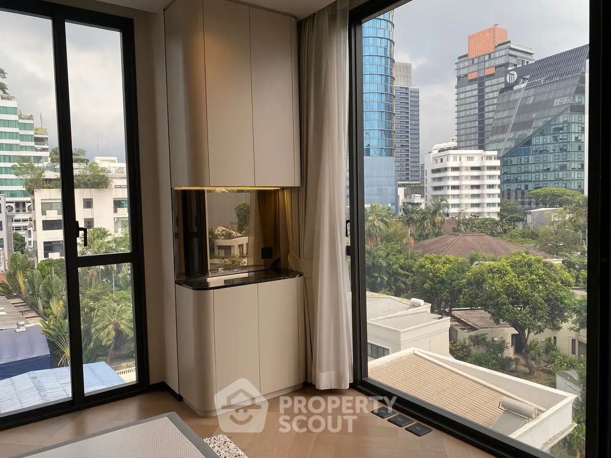 Luxurious corner unit with stunning city view and modern interior design.