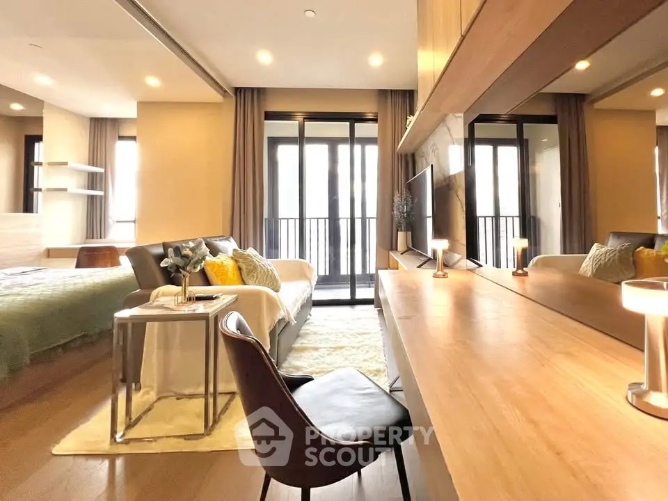Luxurious modern living room with elegant decor and large windows for natural light.