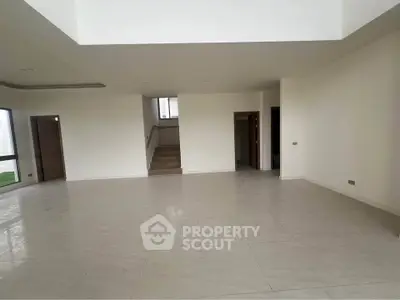 Spacious modern living room with open layout and natural light