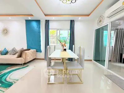 Modern living and dining area with stylish decor and natural light