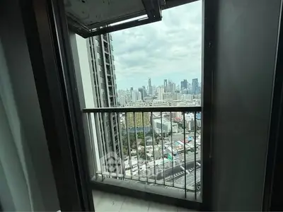 Stunning cityscape view from a high-rise balcony, perfect for urban living enthusiasts.