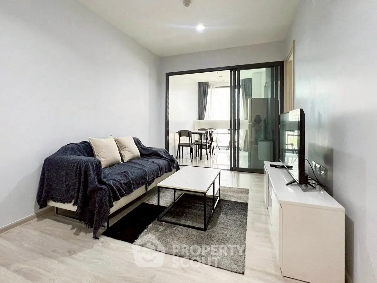 Modern living room with sleek furniture and open layout, perfect for relaxation and entertainment.