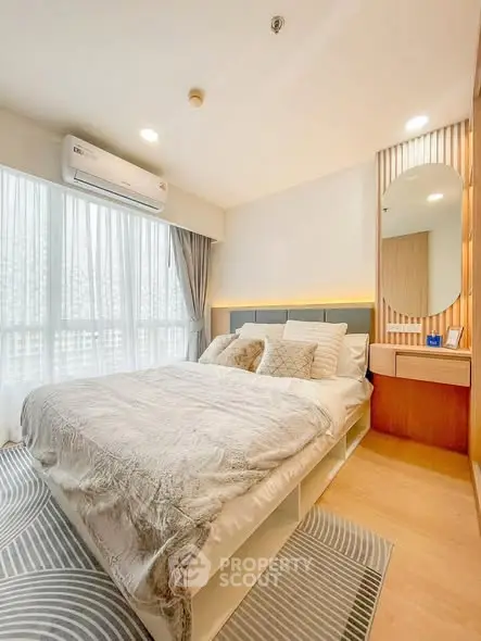 Modern bedroom with cozy decor and natural light