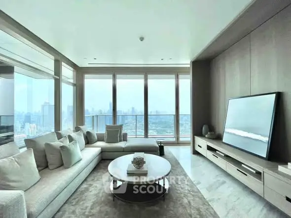Luxurious modern living room with panoramic city views and elegant furnishings.