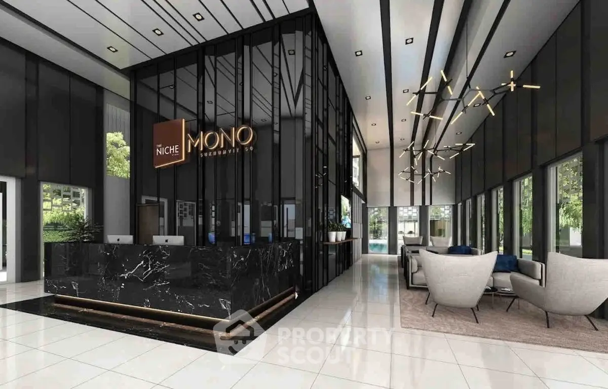 Luxurious modern lobby with elegant design and stylish seating area in upscale building.