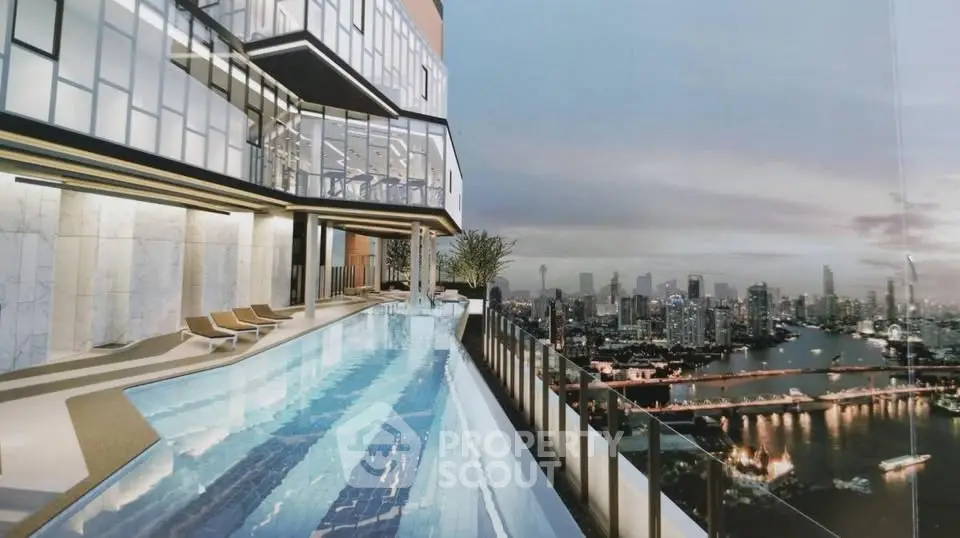 Luxurious rooftop pool with stunning city skyline view at sunset, perfect for urban living enthusiasts.