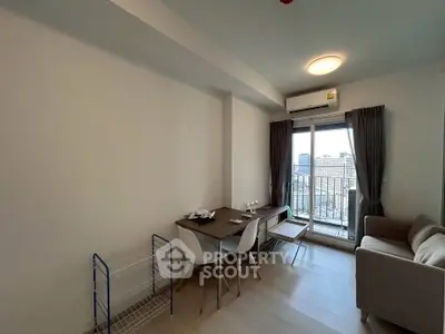 Modern living room with balcony view in urban apartment