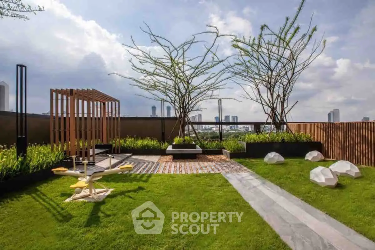 Stunning rooftop garden with city skyline view and modern landscaping.