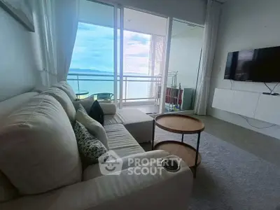 Luxurious living room with stunning ocean view and modern furnishings