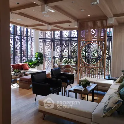 Luxurious modern living room with elegant decor and abundant natural light