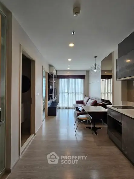 Modern living room with sleek design and natural light