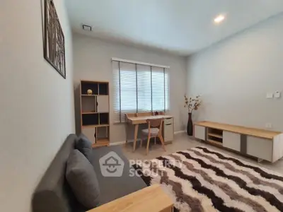 Modern living room with stylish furniture and cozy decor