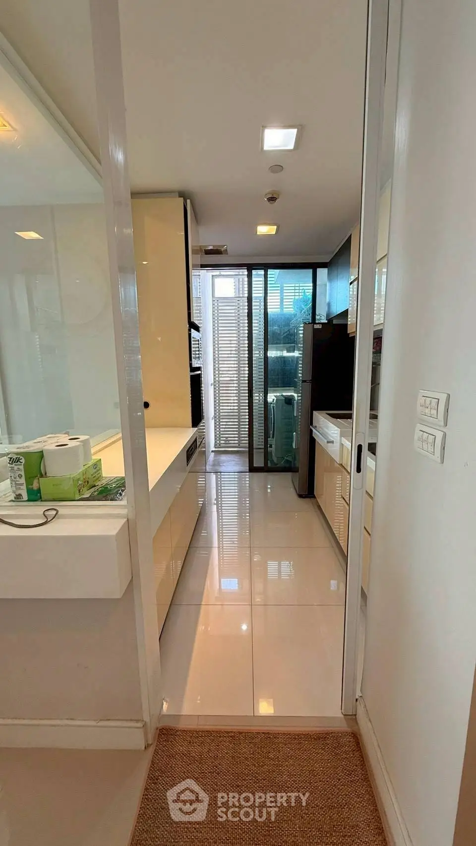 Modern kitchen with sleek design and ample natural light