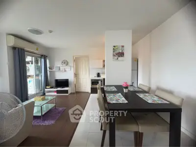 Modern living room with dining area and kitchen in open layout apartment
