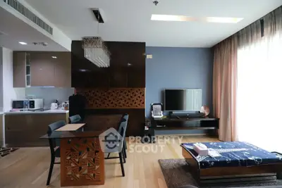 Modern living room with stylish dining area and open kitchen layout