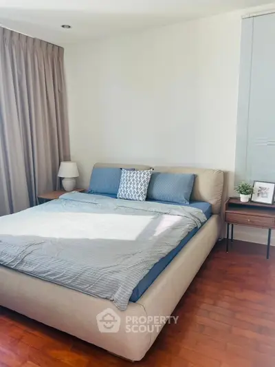 Cozy bedroom with modern decor and natural light