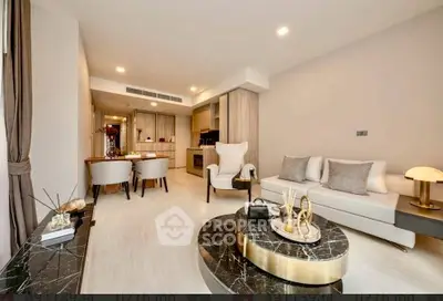 Luxurious modern living room with elegant decor and open kitchen layout in a stylish apartment.