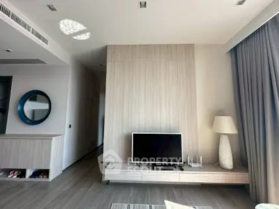 Modern living room with sleek TV unit and stylish decor