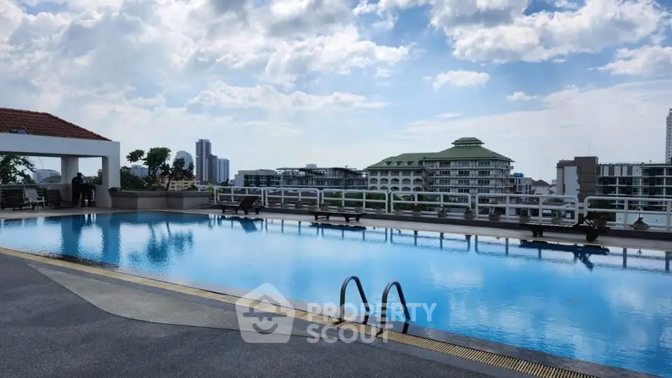 Stunning rooftop pool with panoramic city views and modern amenities.