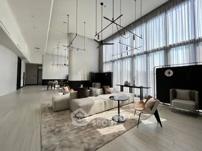 Luxurious modern living room with high ceilings and elegant decor