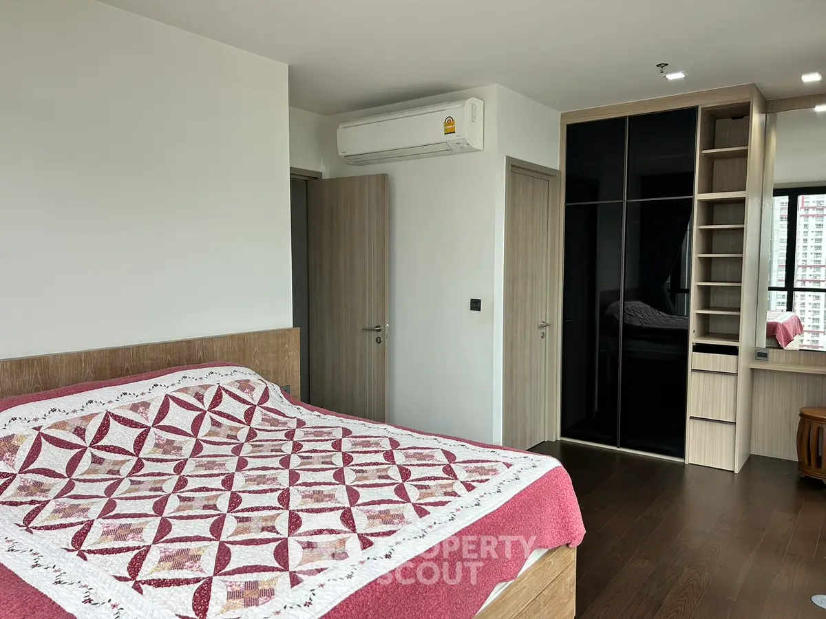 Spacious bedroom with modern design and built-in wardrobe