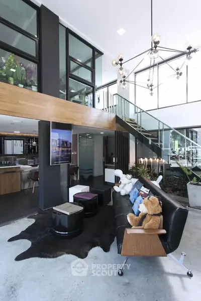 Modern living room with high ceilings and stylish decor