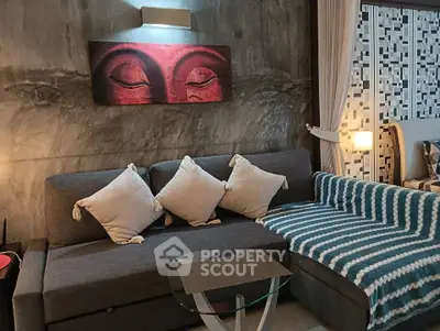 Stylish living room with modern sofa, abstract art, and cozy lighting