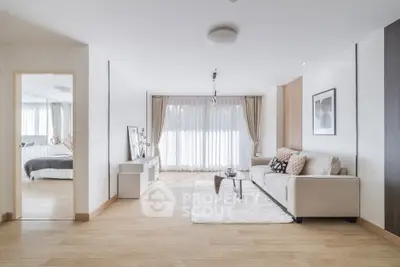 Spacious modern living room with elegant decor and natural light