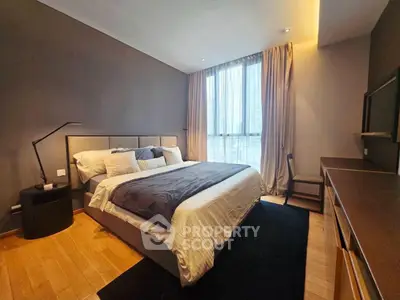 Luxurious modern bedroom with elegant decor and large window view