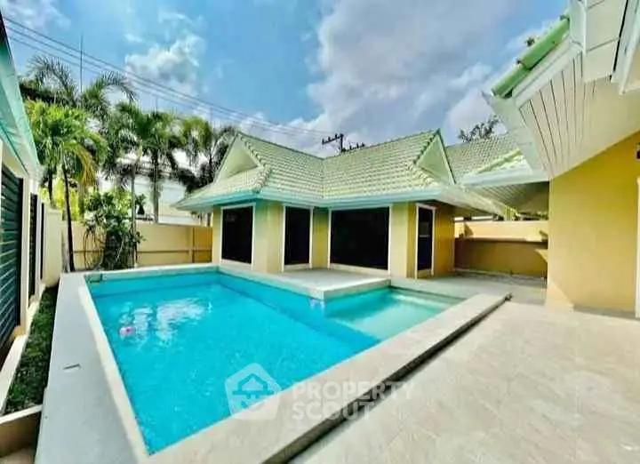 Stunning villa with private pool and tropical landscaping, perfect for luxurious living.