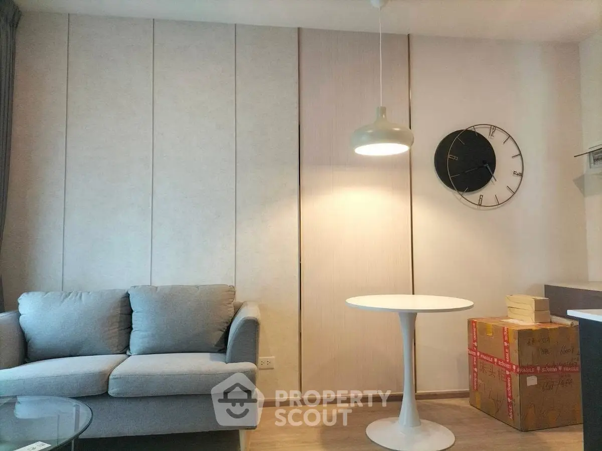 Modern living room with cozy sofa and stylish decor