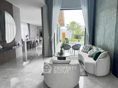 Luxurious modern living room with elegant decor and garden view