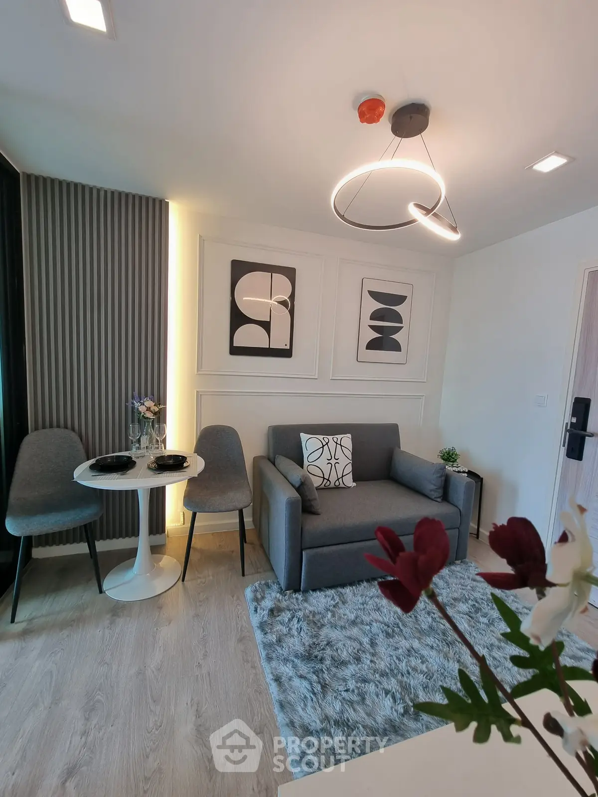 Modern living room with stylish decor and cozy seating area