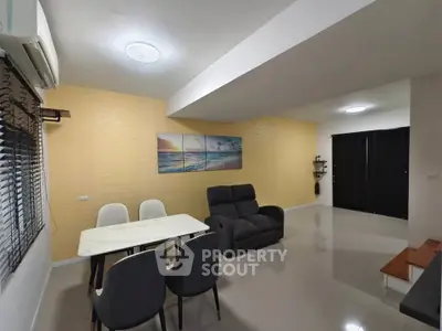 Spacious modern living room with dining area and stylish decor