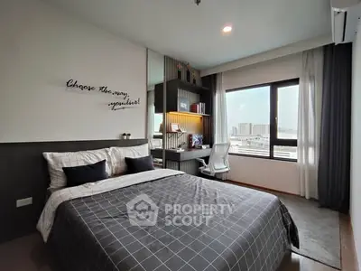 Modern bedroom with stylish decor and city view window