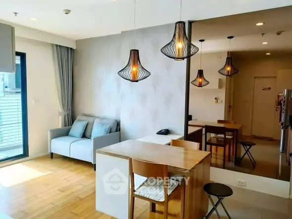 Modern living room with stylish lighting and cozy seating area